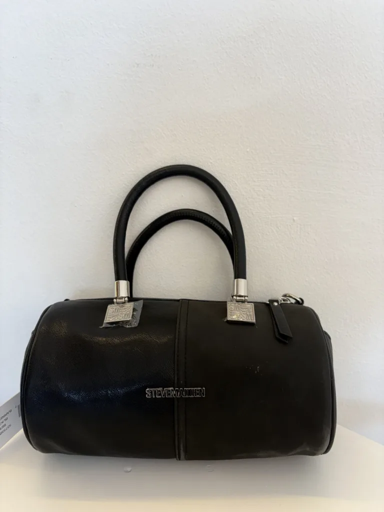 Coach black leather barrel bag