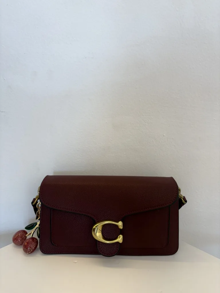 Coach burgundy Tabby flap with cherry charm