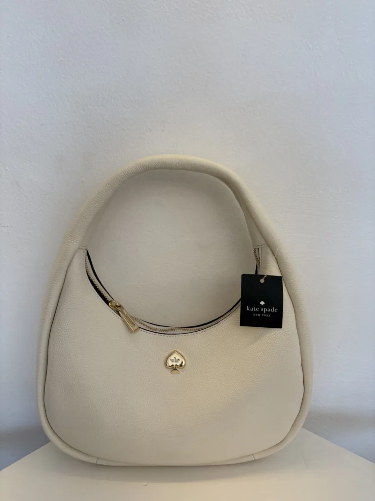 Cream hobo with gold hoop handle