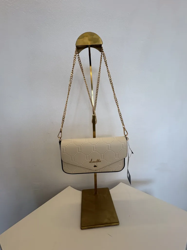 Coach cream flap crossbody with gold chain