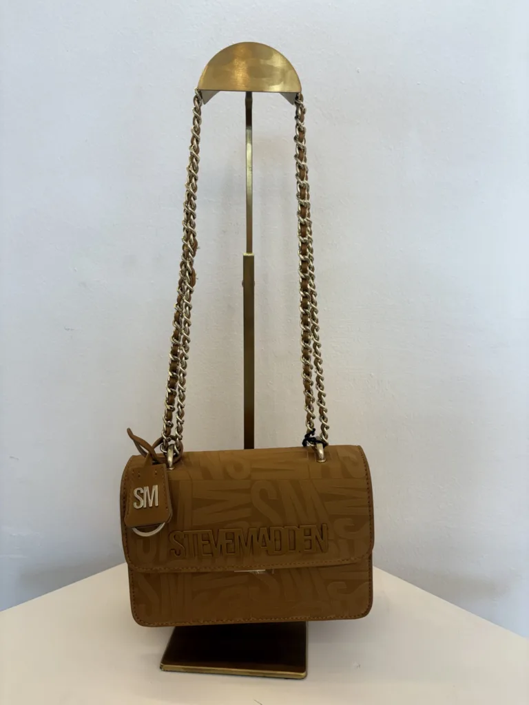 Tan quilted flap bag with chain